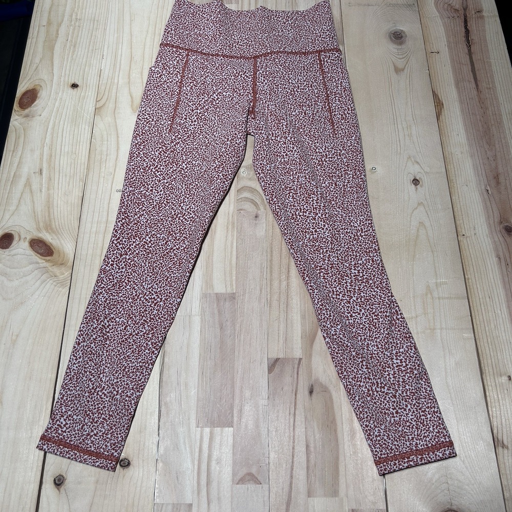 Athleta Orange Cheetah Print Salutation Stash II Textured Tight Leggings Sz XS